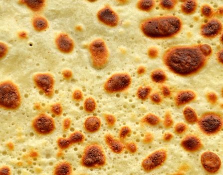 abstract background or texture of pancake batter pattern