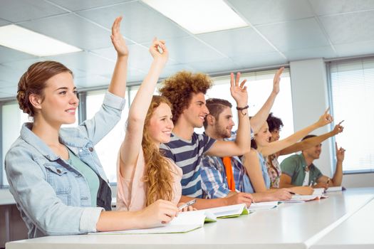 Fashion students being attentive in class at the college