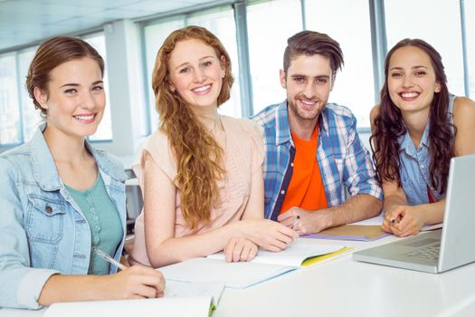 Fashion students looking at camera at college 