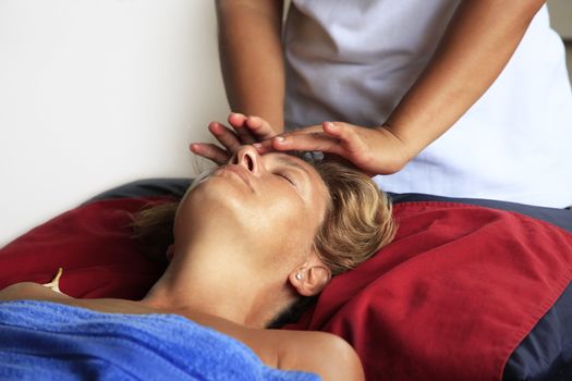 White woman on massage in Bali salon