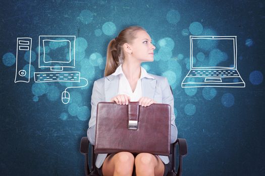 Young Businesswoman Sitting in Office Chair with Briefcase on Lap Looking to the Side at Illustration of Laptop Computer with Desk Top Computer on Other Side, in Decision Making Concept Image