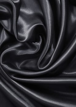 Smooth elegant dark grey silk or satin can use as background 