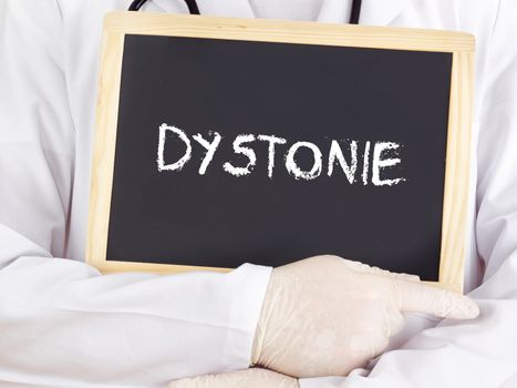 Doctor shows information on blackboard: Dystonia in german