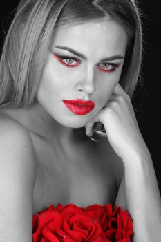 Black and white color portrait of woman with red lips