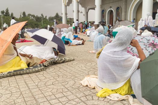 Addis Ababa: April 10: Devoted Ethiopian Orthodox followers observe Siklet, the crucifixion of Jesus Christ, at Bole Medhane Alem Church on April 10 ,2015 in Addis Ababa, Ethiopia