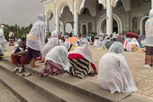 Addis Ababa: April 10: Devoted Ethiopian Orthodox followers bow down hundreds of times to worship God, and remember the pain and suffering of Jesus Christ, during Siklet (crucifixion) on April 10 ,2015 in Addis Ababa, Ethiopia