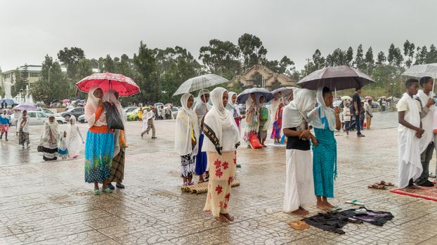 Addis Ababa: April 10: Devoted Ethiopian Orthodox followers observe Siklet, the crucifixion of Jesus Christ, at Bole Medhane Alem Church on April 10 ,2015 in Addis Ababa, Ethiopia