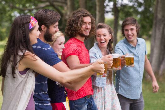 Group of friends celebrating oktoberfest on a sunny day