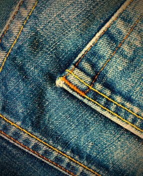 aged blue denim with seams,  close up. instagram image retro style