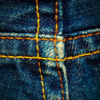 old jeans surface with seams, close up. instagram image retro style