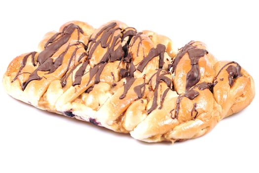 Chocolate and caramel danish pastry on a white background