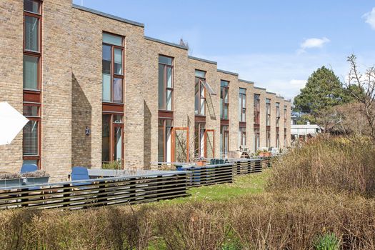 modern brick terrace house exterior in denmark