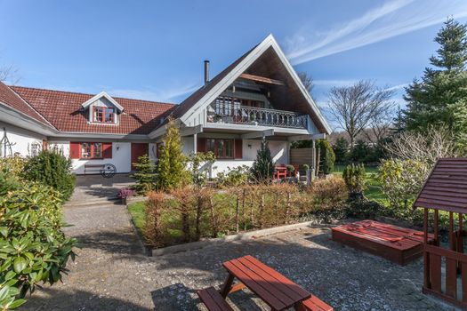 Traditional danish farm house in the sunshine