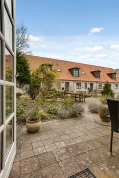 House and terrace in the sunshine