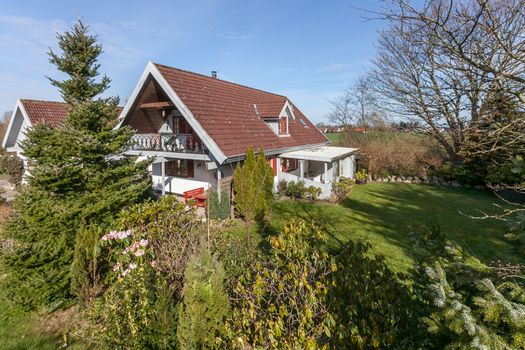 Traditional danish farm house in the sunshine