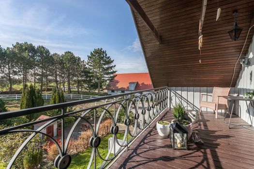 Balcony over looking a horse stable in Denmark