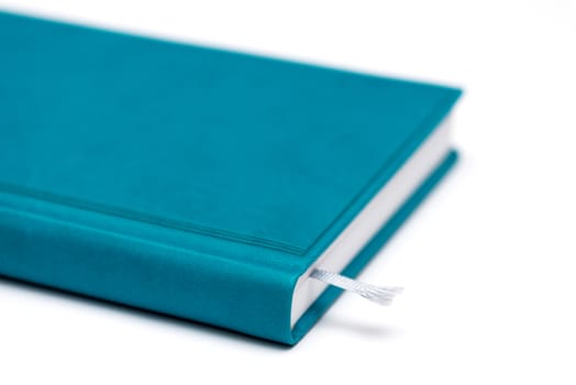 isolated blue notebook on white