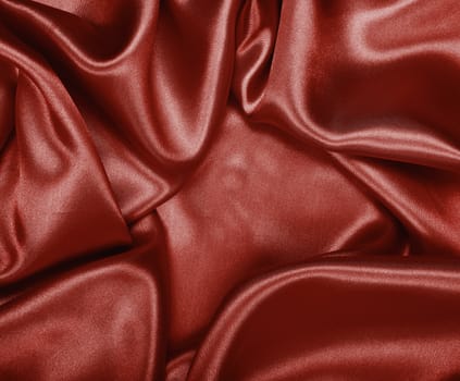 Smooth elegant dark brown chocolate silk or satin can use as background 