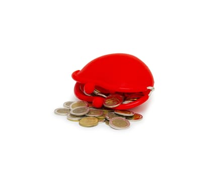 Red purse and coins on white background