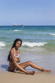 Portrait of a young black woman, outdoors.