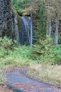 Horsetail Falls, Yakima, Washington, USA, scenic view of the stream cascading over the top of the basalt ledge, a seasonal creek that varies greatly in the amount of water flowing down the rock face