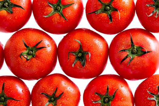 Plenty of Healthy Fresh Red Tomatoes with Water Drops in a Pattern, Isolated on a White Background, Can be Used for Backgrounds.