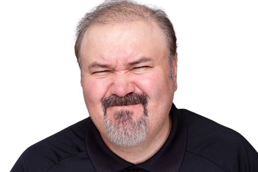 Disgusted unimpressed middle-aged man pulling a disdainful expression , head and shoulders isolated on white