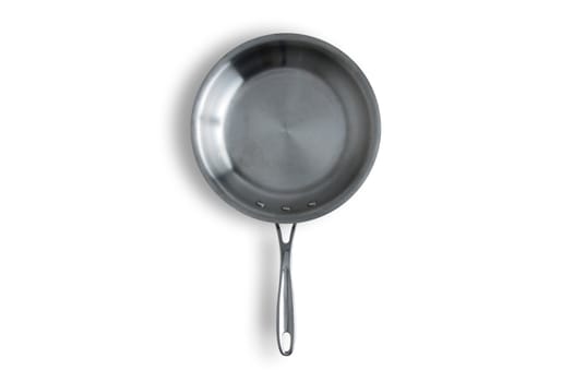 Close up One Clean Steel Kitchen Frying Pan Isolated on a White Background with Copy Space.