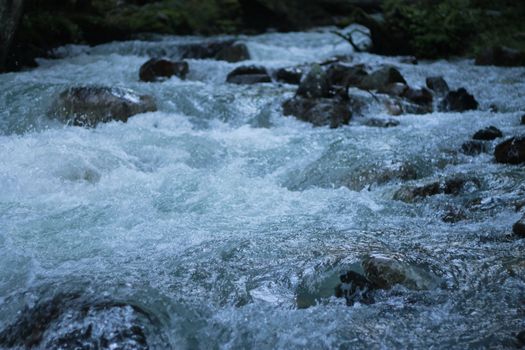 Mountain river run away after the sunset