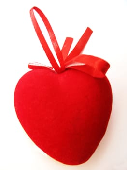 Red valentine heart isolated on the white background