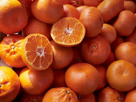 Ripe mandarins clemantins on display in store market    