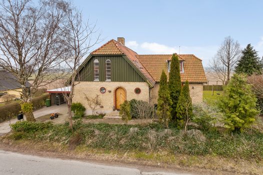 Traditional two story danish house and garden in Denmark