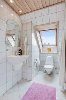 luxury tiled white bathroom in a traditional Danish home