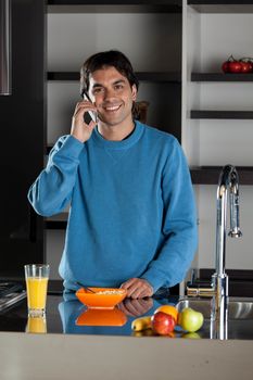 Man talking phone on breackfast