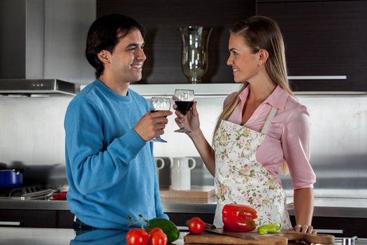 Couple cooking dinner