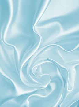 Smooth elegant blue silk or satin can use as background