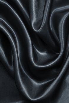 Smooth elegant dark grey silk or satin can use as background 