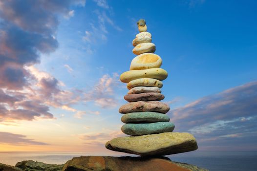 Stones laid out in the form of a pyramid on the seashore