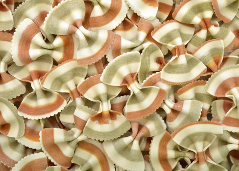 Close-up of raw tricolored pasta to use as background