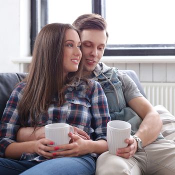 Love, relationship. Beautiful couple at home