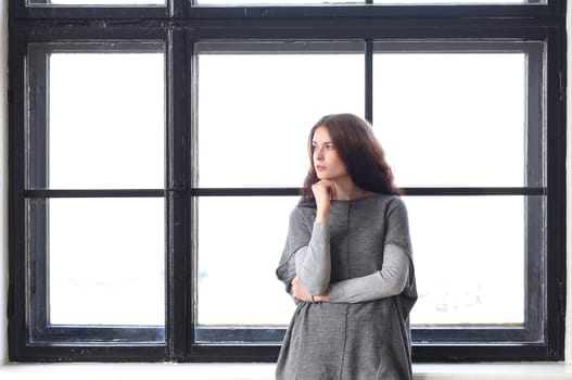 Cute girl by the window