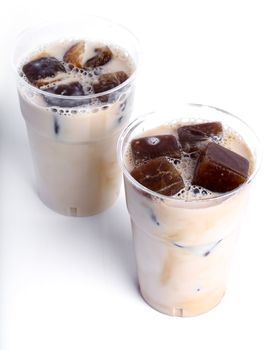 Delicious coffee with ice cubes