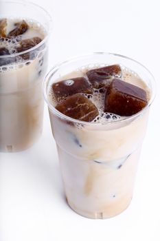 Delicious coffee with ice cubes