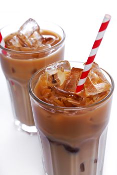 Glass of cold coffee on a white background