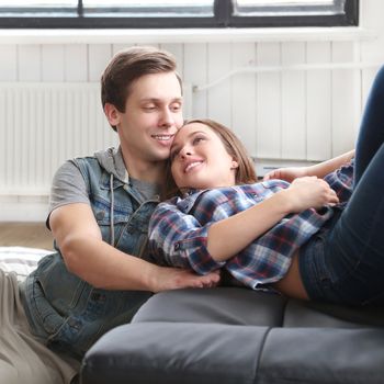 Love, relationship. Beautiful couple at home