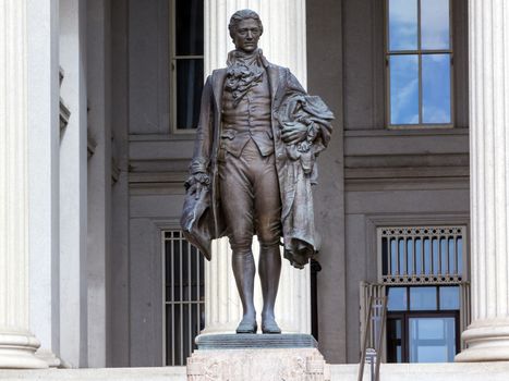 US Treasury Department Alexander Hamilton Statue Washington DC James Fraser Statue dedicated 1923.  One of the founding fathers of the United States, Alexander Hamilton was the first Secretary of the Treasury in George Washington's cabinet.  He was also Chief of Staff to General Washington in the American Revolution.  Involved in writing Constitution, also wrote the Federalist Papers.