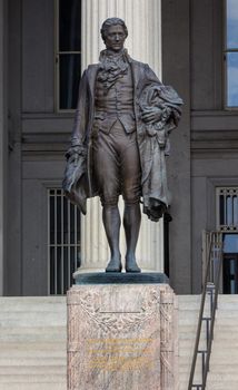 US Treasury Department Alexander Hamilton Statue Washington DC James Fraser Statue dedicated 1923.  One of the founding fathers of the United States, Alexander Hamilton was the first Secretary of the Treasury in George Washington's cabinet.  He was also Chief of Staff to General Washington in the American Revolution.  Involved in writing Constitution, also wrote the Federalist Papers.