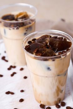 Delicious coffee with ice cubes