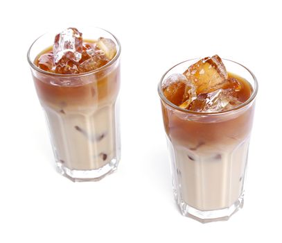 Glass of cold coffee on a white background