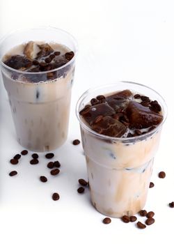 Delicious coffee with ice cubes